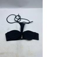 black cross neck tube top with an adjustable snap button closure on the back. black cross neck tube top with an adjustable snap button closure on the back.