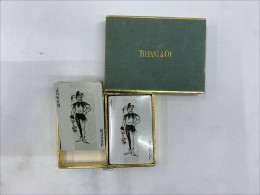 Card game in a gray box.