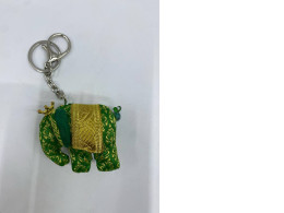 Elephant-shaped keychain, a souvenir from Thailand.