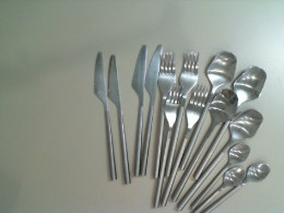 A set of cutlery, 4 knives, 4 spoons, 4 forks, 4 teaspoons