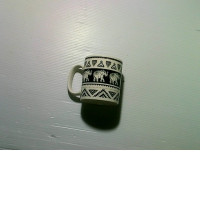 White ceramic mug with Thai elephant pattern White ceramic mug with Thai elephant pattern