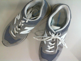 Gray New Balance sneakers. Not new.