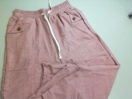 Pink women's trousers with elastic waistband