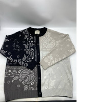 316 Standard by General Idea Kr wool knit cardigan in grey and black with a paisley pattern. 