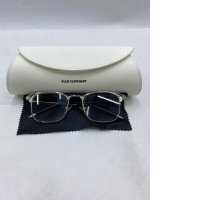 Women's eyeglasses in a white box. Women's eyeglasses in a white box.
