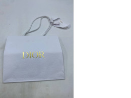 White paper bag, Dior.