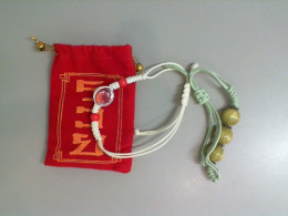 Set of 2 bracelets in a red gift bag