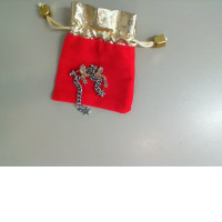 Set of earrings in a red gift bag