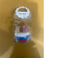 A souvenir in the form of a small vase