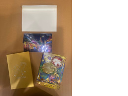 a set of three postcards with an envelope