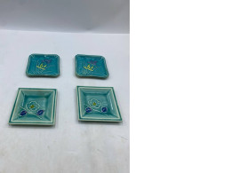 Set of 4 A square, teal glass plate for sushi/desserts from Aito Japan, featuring an embossed floral pattern. Set of 4 A square, teal glass plate for sushi/desserts from Aito Japan, featuring an embossed floral pattern.