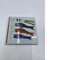 A glass plate decorated with carp (Koi nobori), a traditional Japanese decoration for Children's Day (Tango no Sekku).