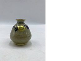 A glass sake bottle containing Kiyomizu-yaki sake, also known as Tokkuri.