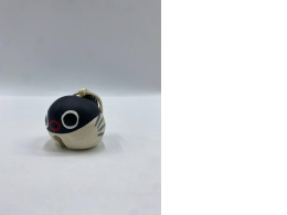 Door bell in the shape of a black pufferfish.