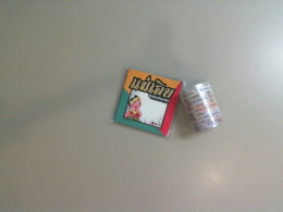 A set of notepads and tape with writing on them A set of notepads and tape with writing on them