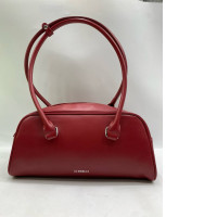 RED CC Double O bowling bag with a detachable shoulder strap. 