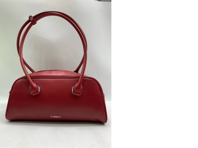 RED CC Double O bowling bag with a detachable shoulder strap. RED CC Double O bowling bag with a detachable shoulder strap.