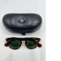  pair of Moncler round tortoiseshell sunglasses with a black case.  
