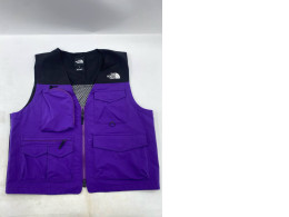 A contrasting purple and black utility vest from the exclusive BEAMS x The North Face Summer 2018 collection.