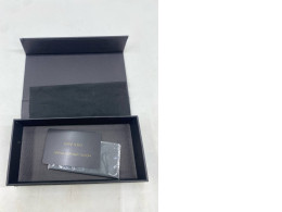 Empty GRESSO box, black.