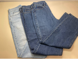 a set of three jeans