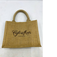  natural jute tote bag featuring the "Café del Mar Phuket" logo. 