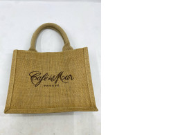 natural jute tote bag featuring the "Café del Mar Phuket" logo. natural jute tote bag featuring the "Café del Mar Phuket" logo.