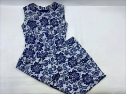 blue and white floral print sleeveless dress. blue and white floral print sleeveless dress.