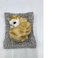 Sleeping cat doll that absorbs odors