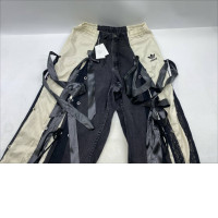 Adidas Ribbon Parachute Pants in Black. 