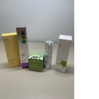 A facial cosmetics set that includes: lip mask, facial serum, sunscreen, lifting eye cream, and toning facial cream.