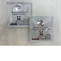 Set of 2 Nong Pho Milk Tablets, a product under the royal patronage of Thailand, are available in sweet and chocolate malt flavors.