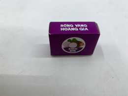 small purple box of Rồng Vàng Hoàng Gia taro green bean cake. 