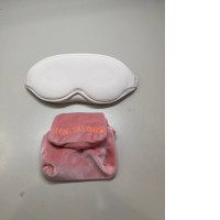 sleep mask included with a bag