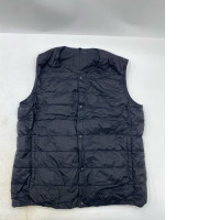 Muji lightweight pocketable collarless down vest in black. 