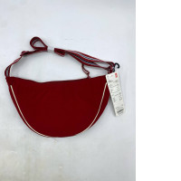 Uniqlo Round Mini Shoulder Bag in red nylon. 