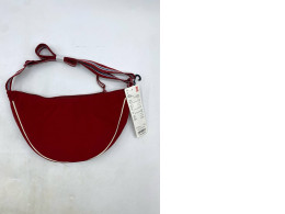 Uniqlo Round Mini Shoulder Bag in red nylon. 