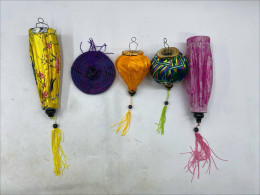 Set of 5Handmade silk and bamboo lanterns from Vietnam, often called Hoi An lanterns, are believed to bring good luck. Set of 5Handmade silk and bamboo lanterns from Vietnam, often called Hoi An lanterns, are believed to bring good luck.