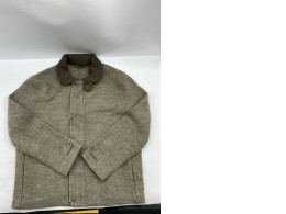 The RWS faux fur jacket with ribbed collar from COS is available in greyish brown or beige.