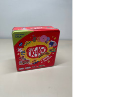 a selection of chocolates in a tin