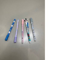 set of five pens