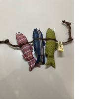 plush toys in the shape of fish