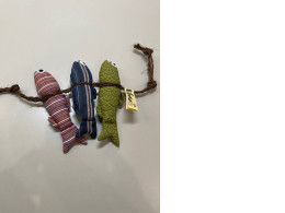 plush toys in the shape of fish