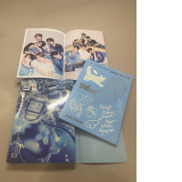 a set of two photo albums and two CDs with songs