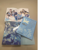a set of two photo albums and two CDs with songs