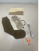 Travel kit including: sleep mask, socks, teeth cleaning kit, eyebrow brush