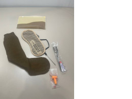 Travel kit including: sleep mask, socks, teeth cleaning kit, eyebrow brush Travel kit including: sleep mask, socks, teeth cleaning kit, eyebrow brush