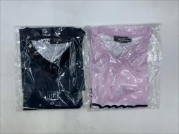 Set of 2 V-neck sports shirt, black and pink. 