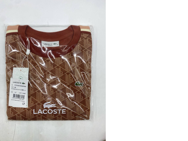 Lacoste Slim Fit T-shirt in a brown geometric print. Lacoste Slim Fit T-shirt in a brown geometric print.