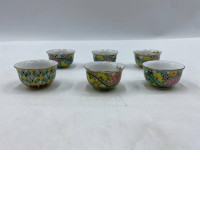 Set of 6 The Benjarong Chinese-style teacup features vibrant floral patterns on a yellow background, with a gold-plated rim. Set of 6 The Benjarong Chinese-style teacup features vibrant floral patterns on a yellow background, with a gold-plated rim.